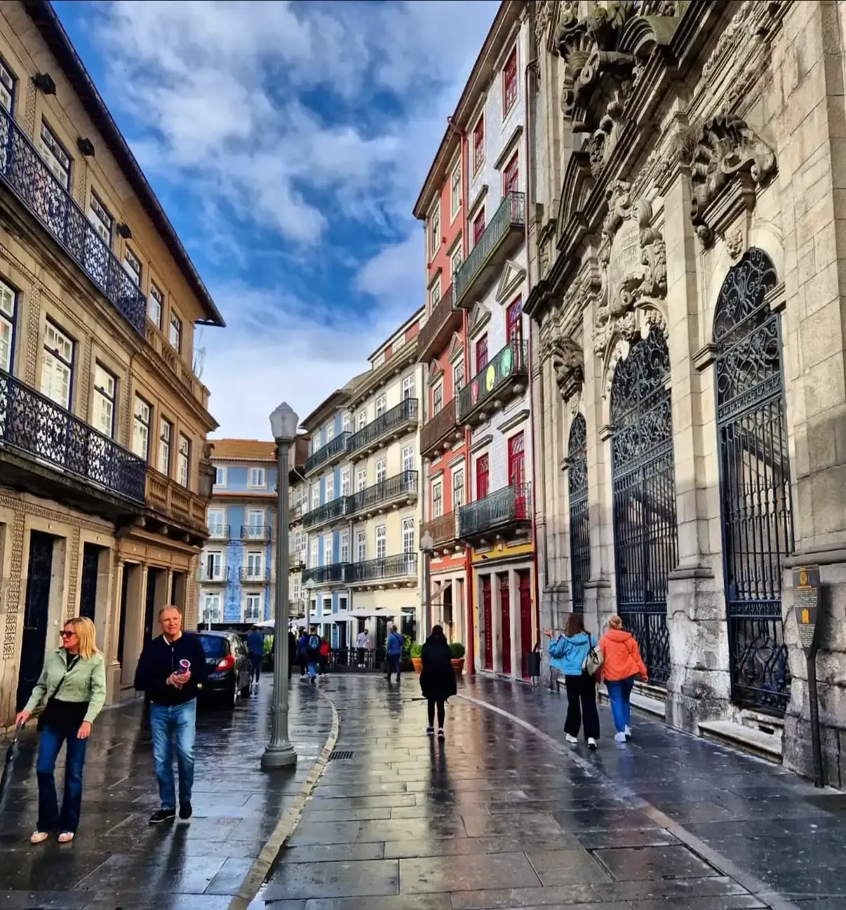 View of Porto in the rain with the Dom Luís I Bridge and the Douro River